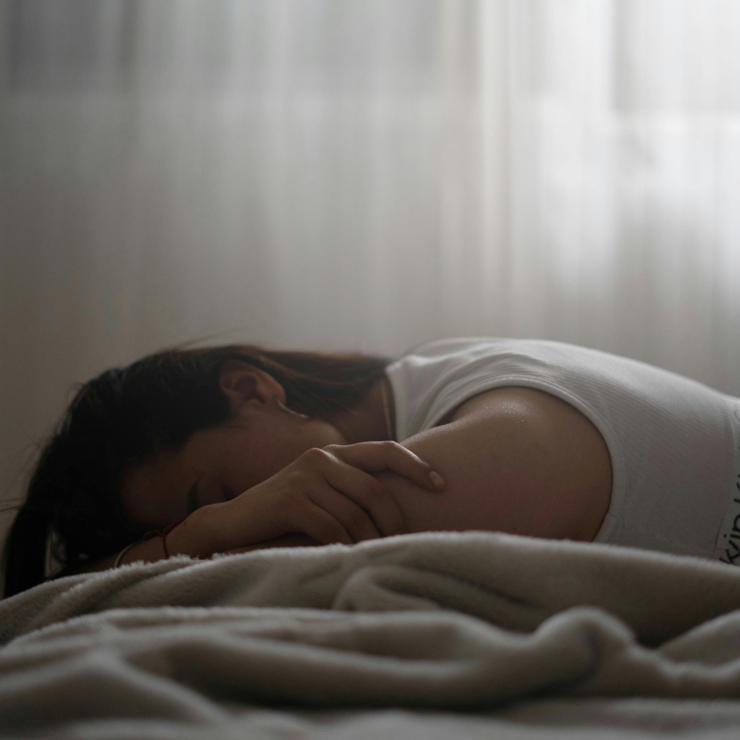 woman in bed resting 