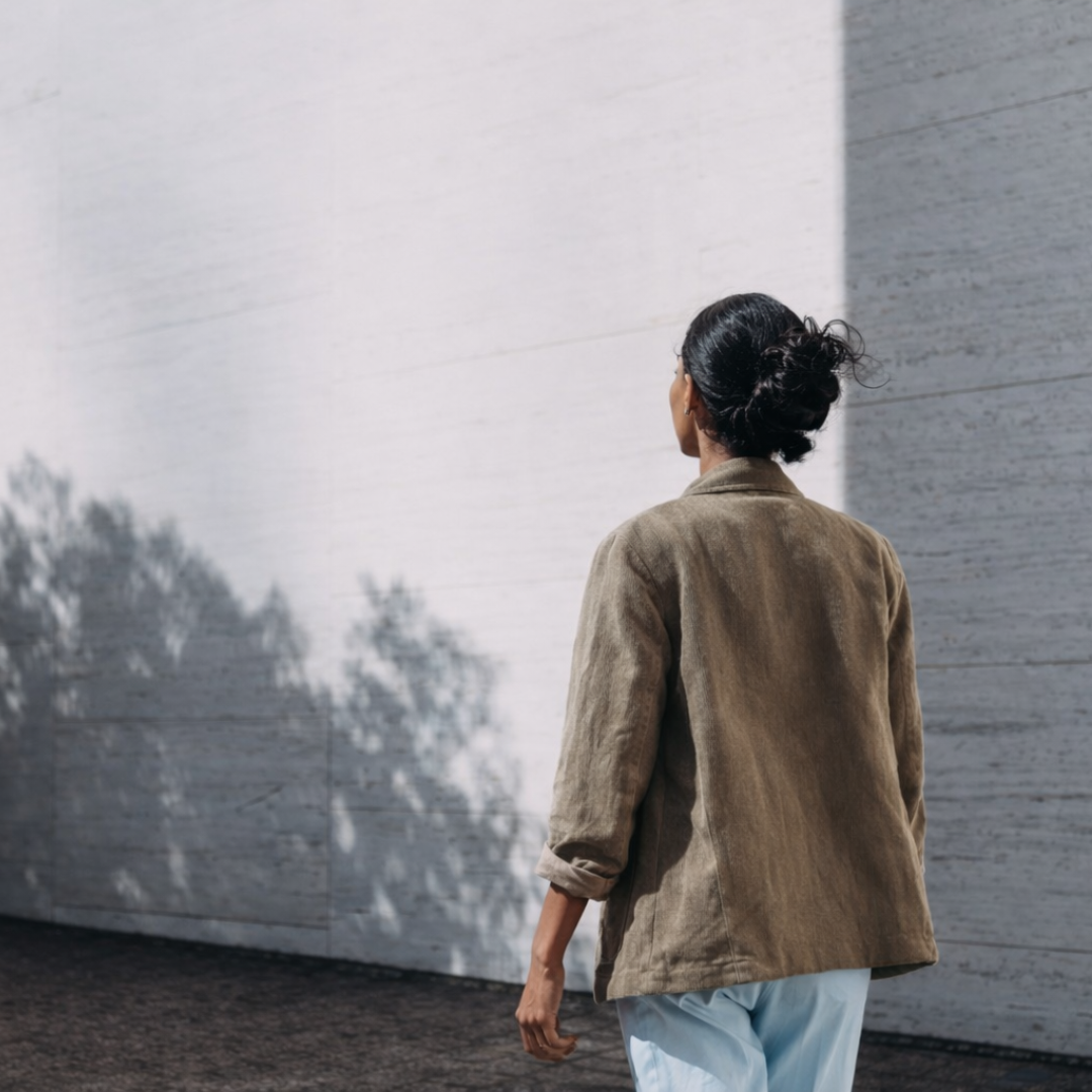 woman walking down road